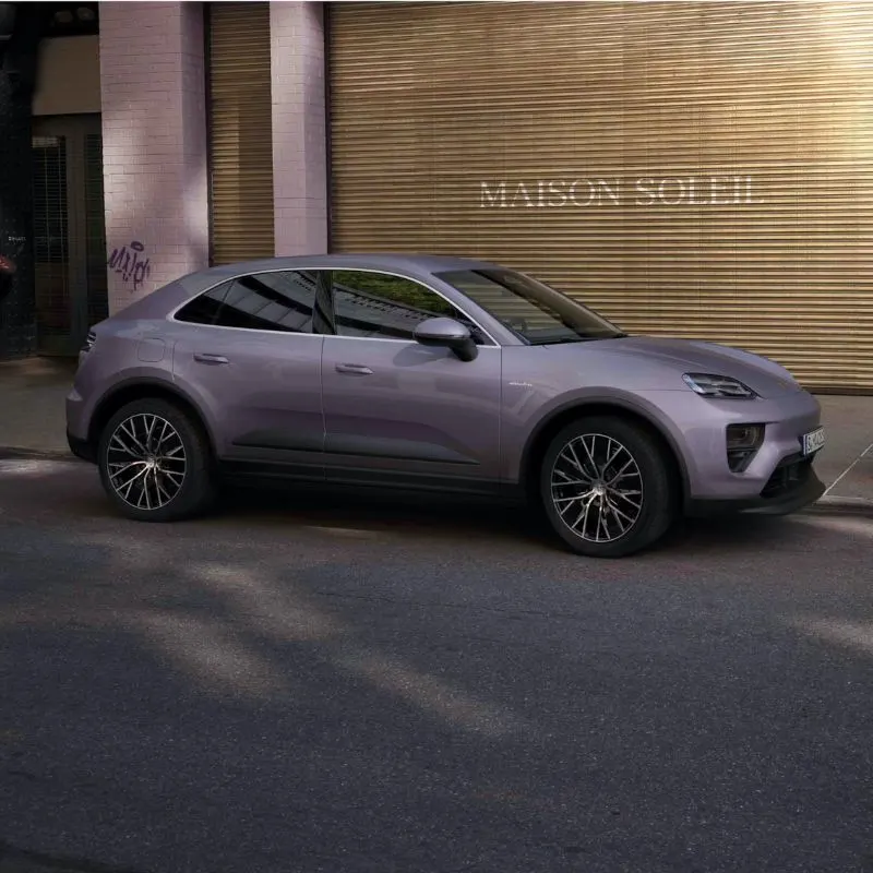 2024 Prsche Macan EV - Purple SUV parked on the street