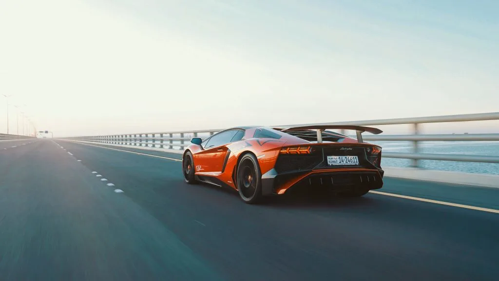 Lamborgini speeding on a highway