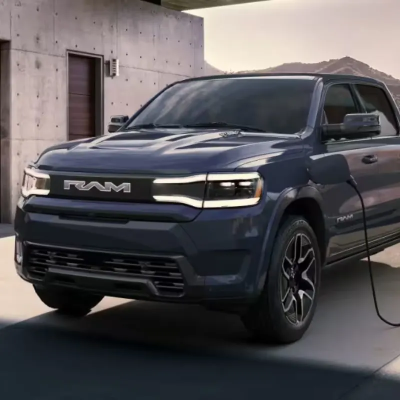 2024 Dodge Ram 1500 REV - Blue EV truck (3:4 view)